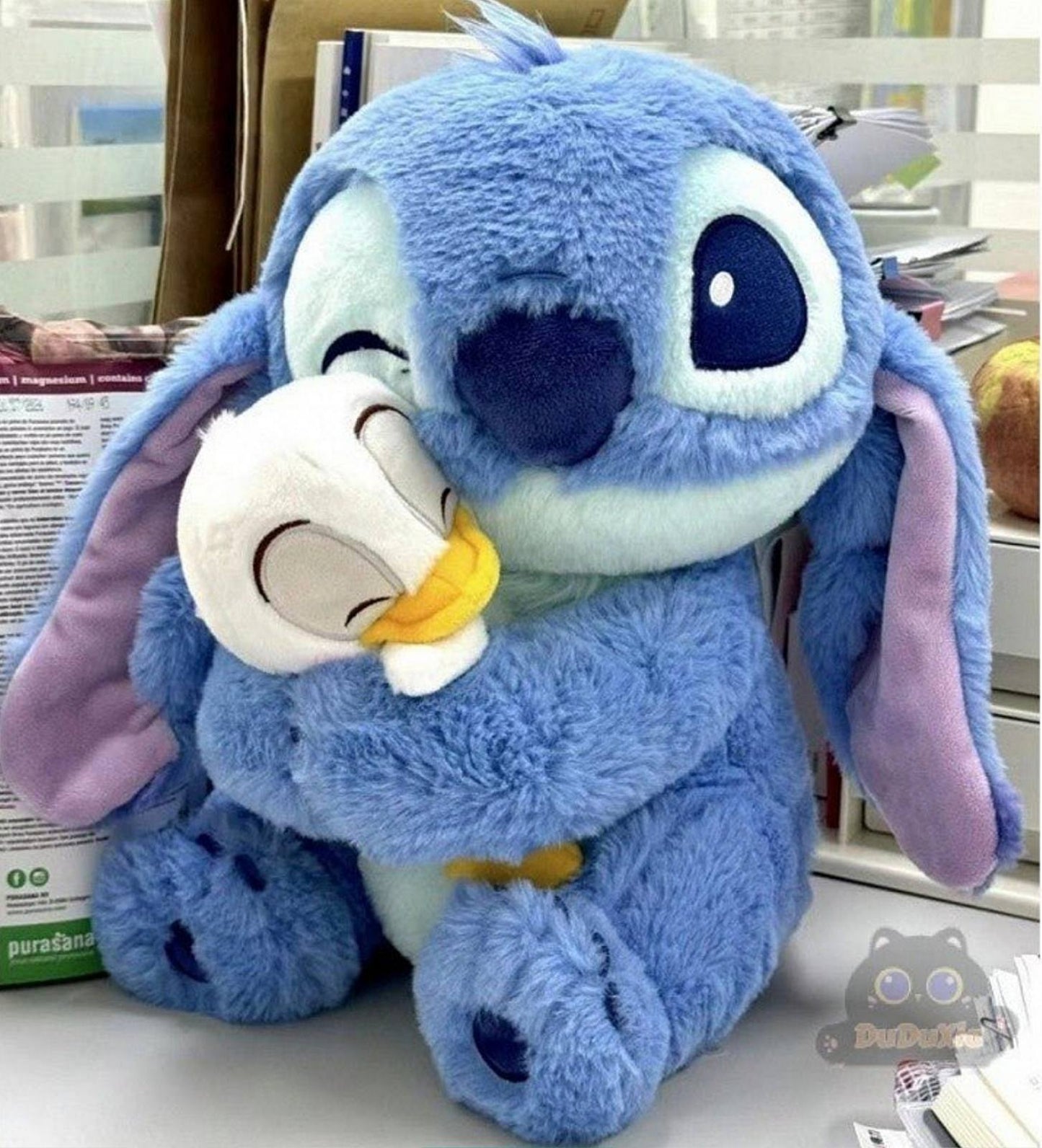 Stitch plišana igračka sa pačetom